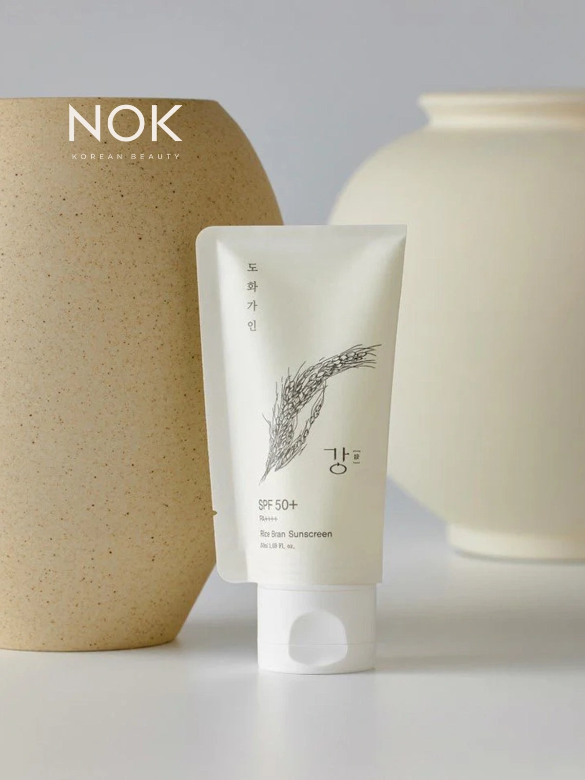 Rice Bran Sunscreen 50ml – Lightweight Korean SPF with Oryza Sativa extract, niacinamide, and Centella Asiatica. A K-beauty sun care essential, inspired by NOK Beauty, that protects like a smooth layer of rice cream on your skin.