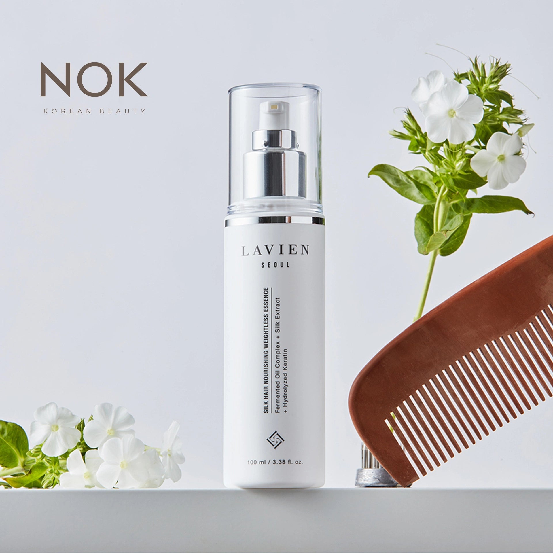 "Bottle of Silk Weightless Hair Essence – Korean lightweight formula for hydrated, manageable hair